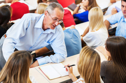 teacher leaning smiling